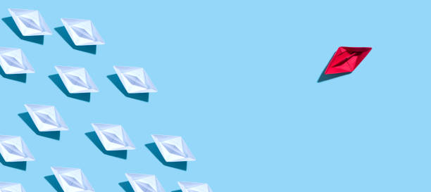 istock Paper boats minority theme 1044936104