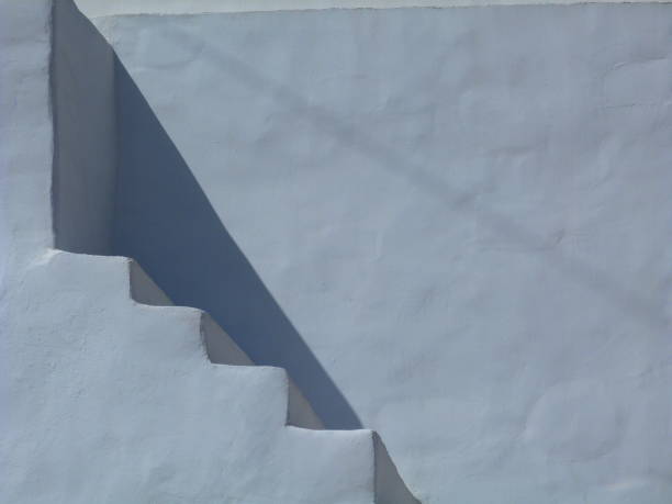 istock White wall and steps, island of Serifos, Cyclades, Greece 1044942522