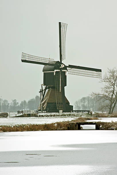 istock Traditional dutch windmill in wintertime the Netherlands 104495487