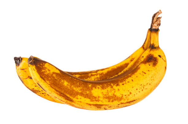 istock Overripe bananas isolated on white background 1044960696