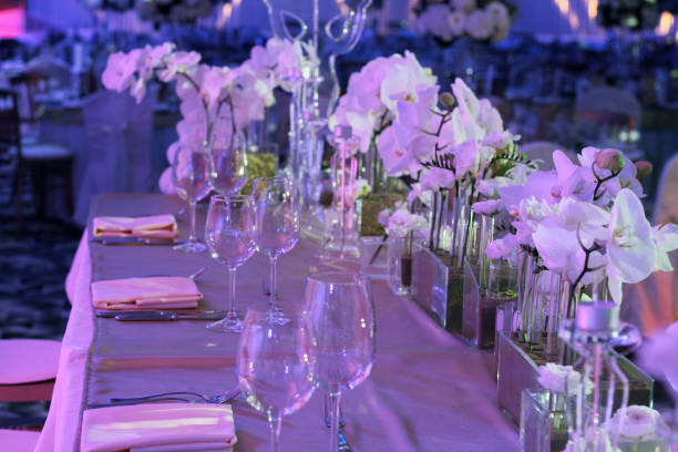 istock Wedding table flower decoration. Orchid bouquet. Restaurant ,Glamorous Event, celebration 1044960990