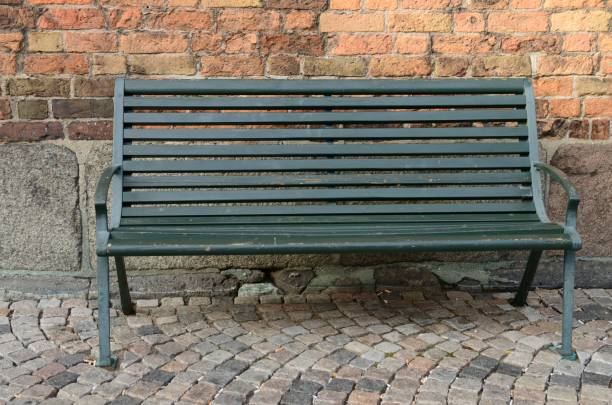 istock Green wooden bench 1044961488