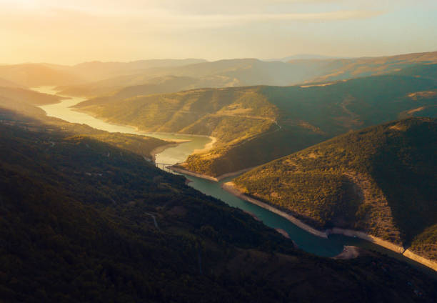 istock River winding in the mountain aerial view 1044964746