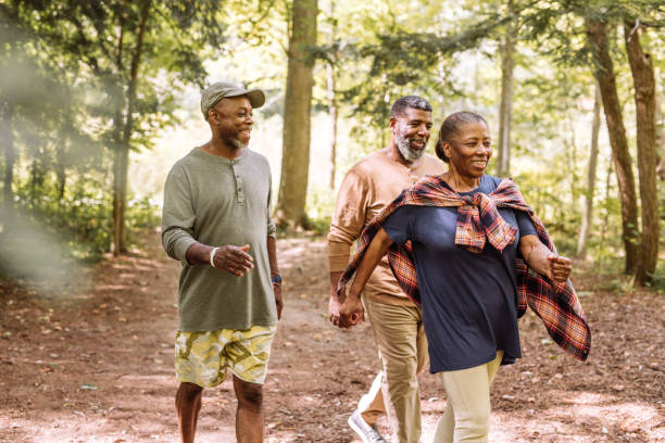istock best friends walking in the park 1044967998