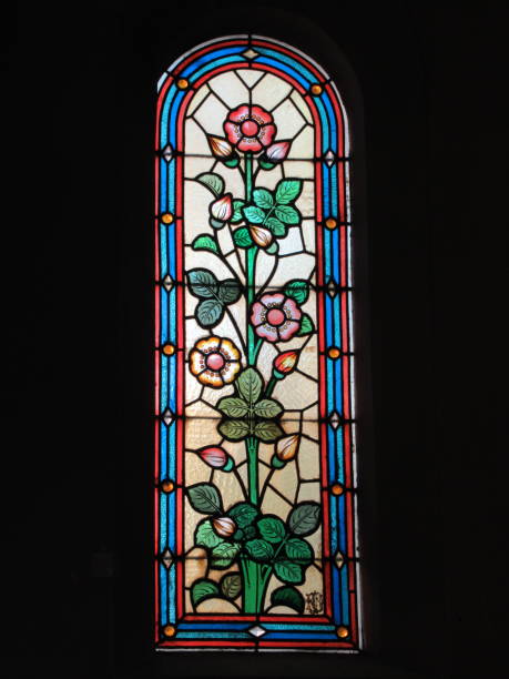 istock Hollyhock stained glass window 1044975844