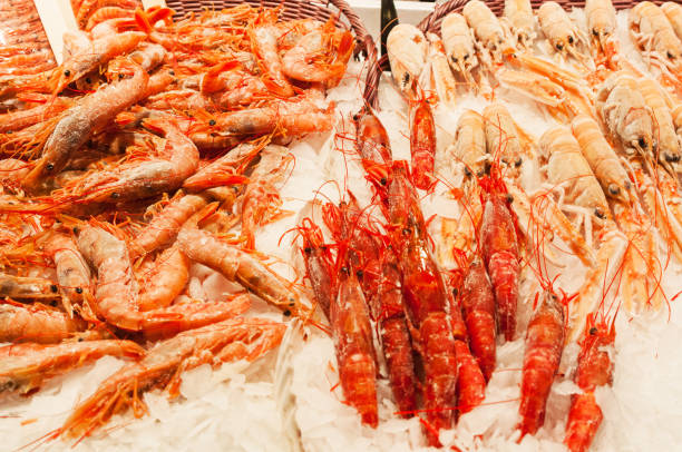 istock Fresh shrimps on ice at market stall 1044979316