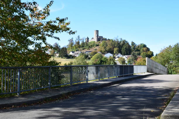 Nürburg and bridge across the track public road on old abandoned part of Nürburgring, the former Südschleife, which no longer exists nürburgring stock pictures, royalty-free photos & images