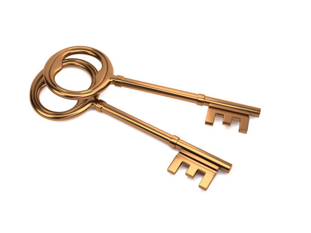 istock metal keys on white background - gold - 3d illustration - rendering 1044980472