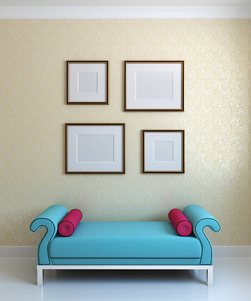 istock Blue ottoman and emty frames on the wall 104498127