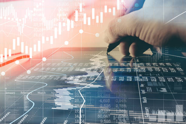 istock Man is working on virtual business charts. 1044982936