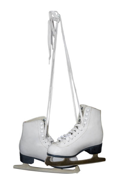 Old white skates for figure skating with. Isolated on white background. The selected path.