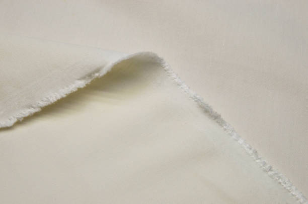 istock Cotton fabric with flax, ivory 1044986244
