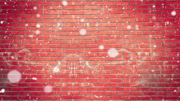 Christmas new year snowy day copy space on red brick wall background
