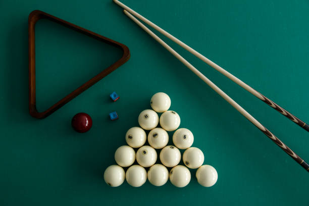 istock Russian billiard balls, cue, triangle, chalk on a table. 1044990998