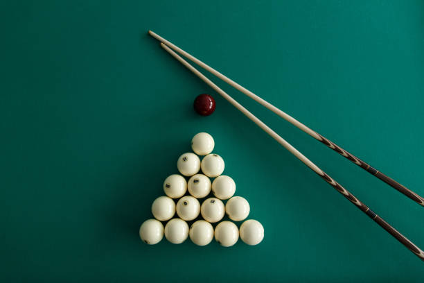 istock Russian billiard balls, cue, triangle, chalk on a table. 1044992188