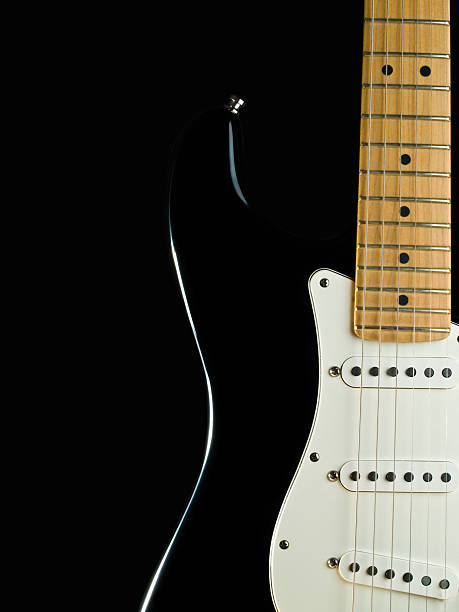 istock Strat-style black electric guitar 104499223