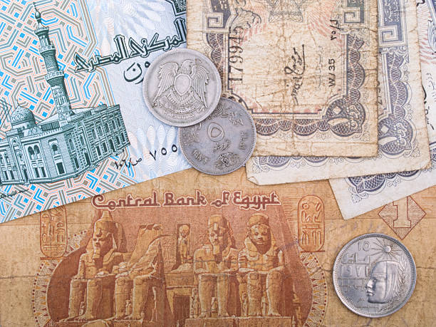 istock Old Egyptian banknotes and coins 104499347