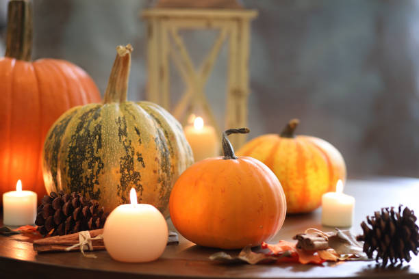 istock Halloween, autumn scene with pumpkins and candles. 1045002418