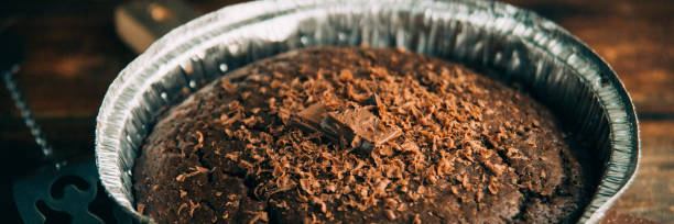 istock Dark chocolate cake on a wooden table 1045003710