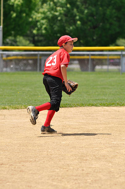 istock Youth league shortstop baseball player 104500582