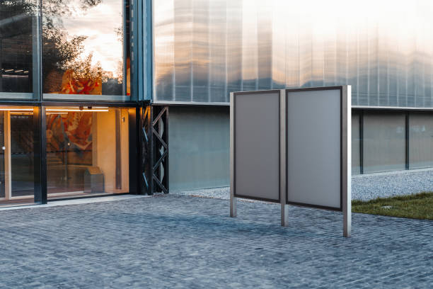 istock Two blank banner stands at park. Empty billboard advertising. 3d rendering. 1045008572