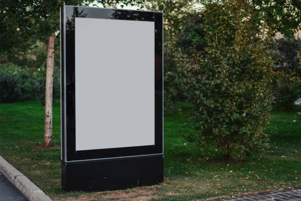 istock Blank canvas banner stand at park. Empty billboard advertising. 1045008618