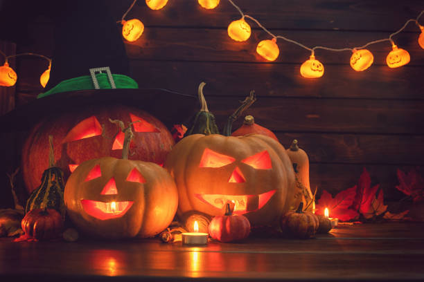 istock Jack O’ Lanterns on The Old Wooden Background 1045008672