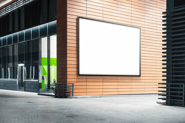 istock Blank white outdoor banner at bright modern building wall, 3d rendering. 1045009164