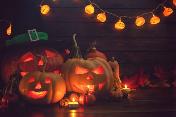 istock Jack O’ Lanterns on The Old Wooden Background 1045009282