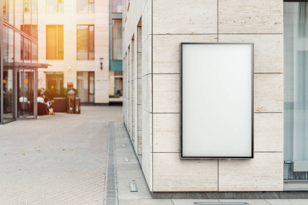 istock Blank vertical outdoor banner at bright modern building wall, 3d rendering. 1045012300