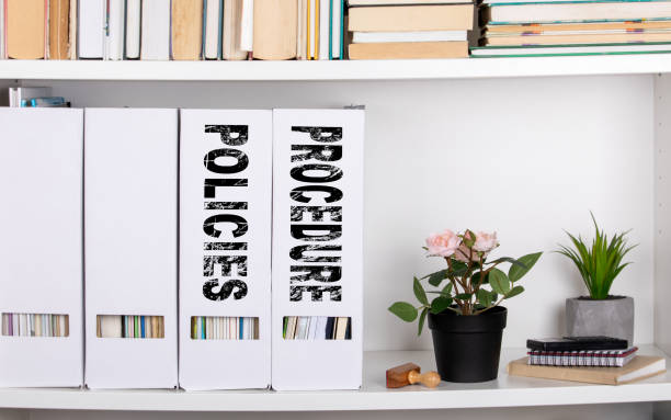 istock Policies and Procedure concept. document folders and organizers 1045012320