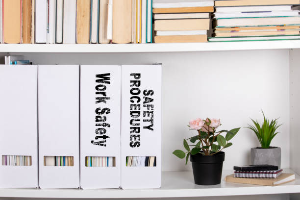 istock Work Safety and Safety Procedures concept. document folders and organizers 1045012636