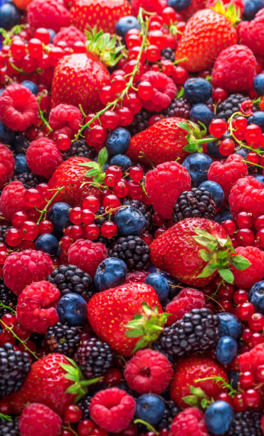istock Berries overhead colorful assortment strawberries blackberries red currant raspberries arrangement 1045020416