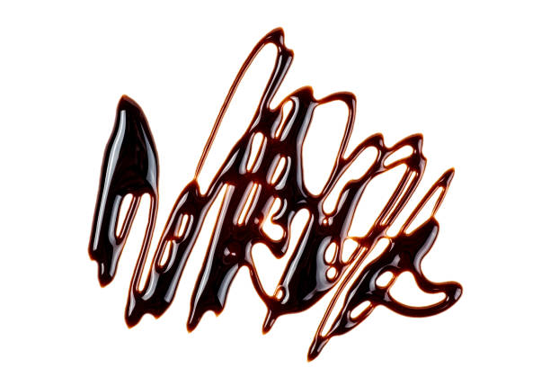 istock Sweet chocolate sauce isolated on a white background. Top view. 1045033138