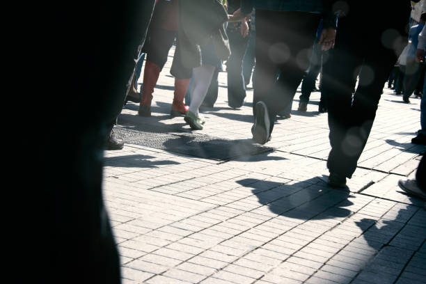 istock Close up people walking on busy street 1045039270