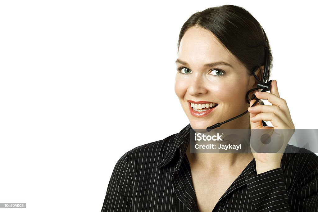 Attractive woman with headset isolated over white  Adult Stock Photo