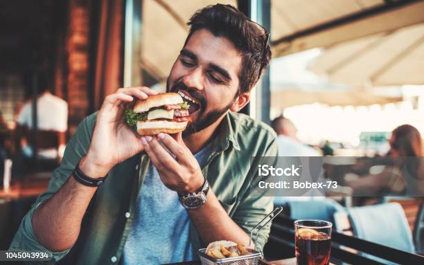 Breakfast In A Cafe Food Lifestyle Concept Stock Photo - Download Image Now - Eating, Burger, Men