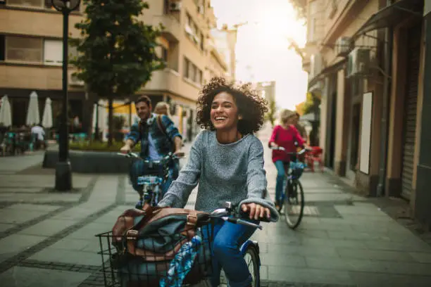 Photo of Young People Exploring The City On Bicycles