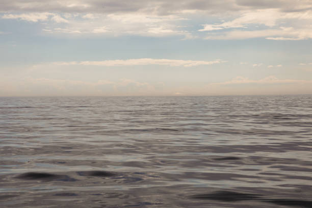 istock blue sea and clouds on sky 1045045332