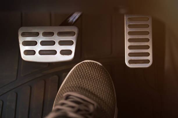 istock Car pedals and shoe 1045058614