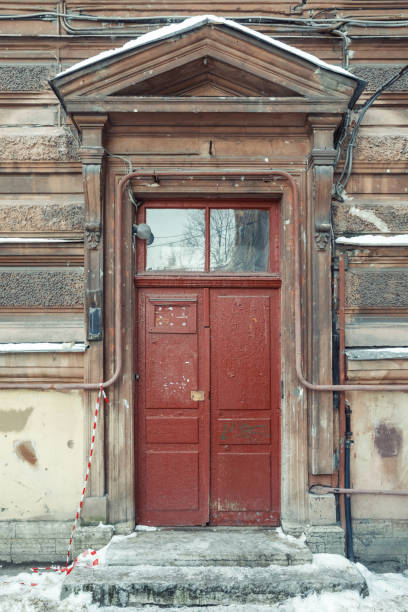 istock beautiful old wooden door with a visor 1045061364
