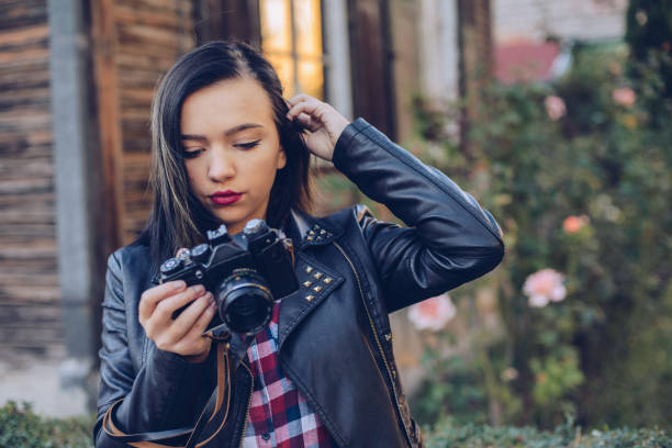 istock Woman artistic photographer. 1045069202