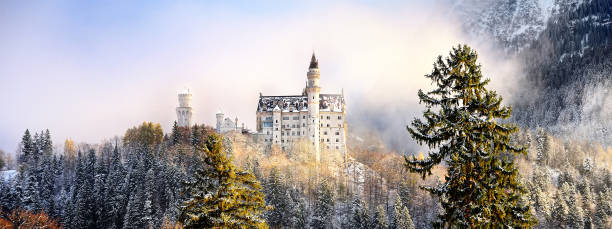 Splendid scene of royal castle Neuschwanstein and surrounding area in Bavaria, Germany (Deutschland) Bavaria, Germany  - NOVEMBER 14 2017: Splendid scene of royal castle Neuschwanstein and surrounding area. Famous Bavarian destination sign at sunny snowy winter day. fussen stock pictures, royalty-free photos & images