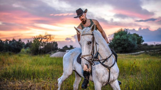 istock Horseback riding home on the range 1045085526