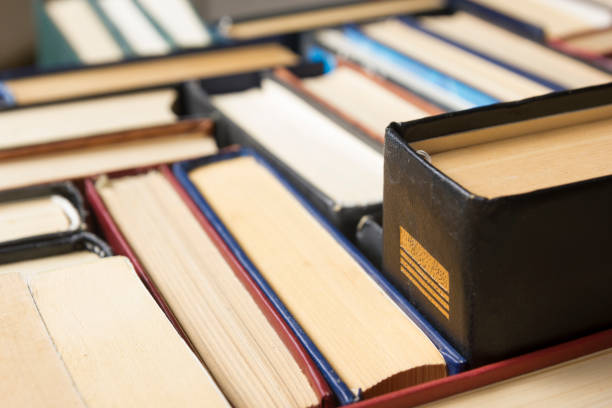istock Stack of books background. many books piles. 1045103402