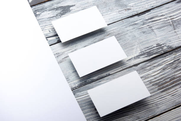 istock Business cards blank. Mockup on color background. Flat Lay. copy space for text 1045103414