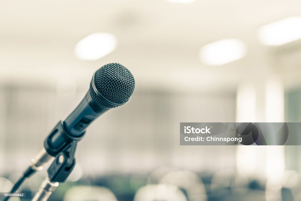 Microphone speaker in school lecture hall, seminar meeting room or educational business conference event for host, teacher or coaching mentor Day Stock Photo