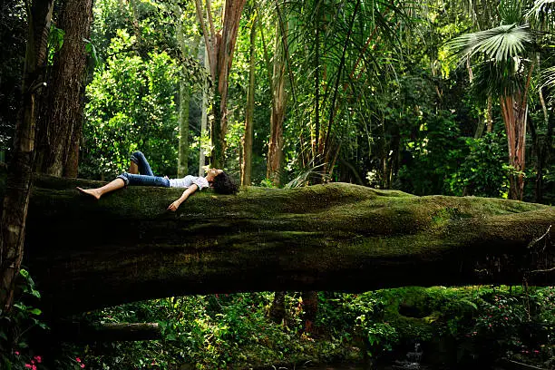 Photo of woman relaxing in the forest