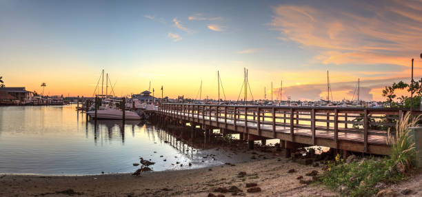 istock Sunrise over Naples City Dock in Naples, Florida. 1045116254