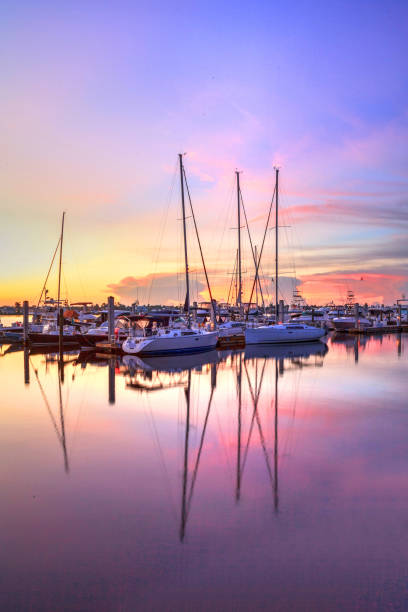 istock Sunrise over a quiet harbor in old Naples, 1045116700